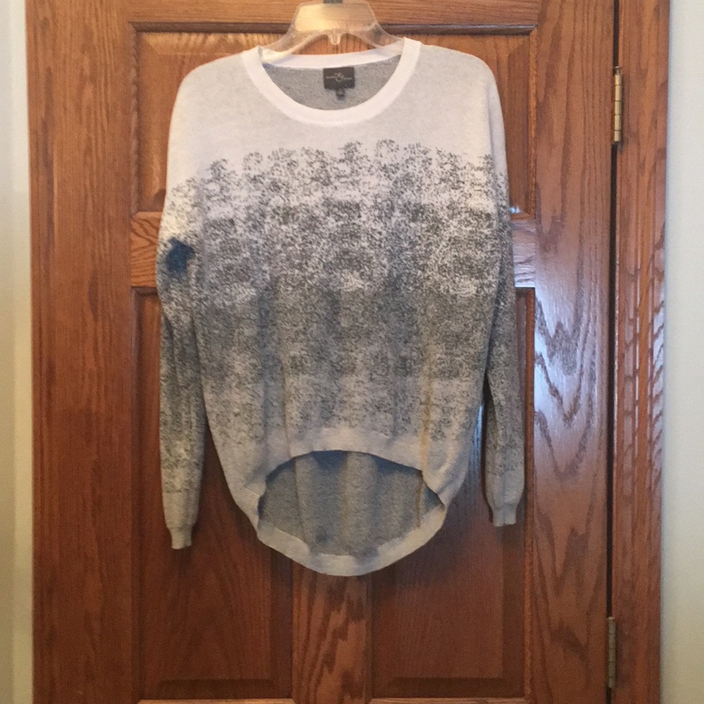 Long sleeved sweater.